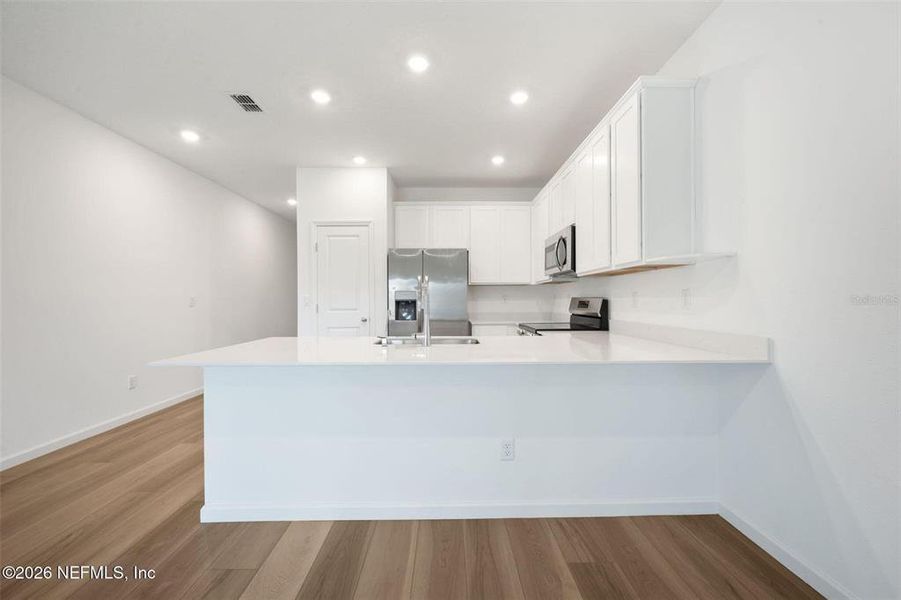 Furnished interior view inside a new home in , Orange Park (Image 4).