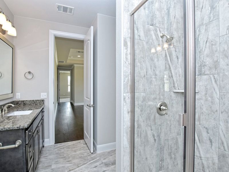 Representative furnished interior of a home built from the Coronado I by Giddens Homes in Clearwater Ranch, Liberty Hill (Image 6).