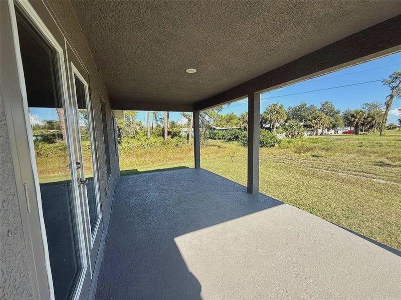 Exterior details and patio area of a home in Rotonda, Rotonda West (Image 15).