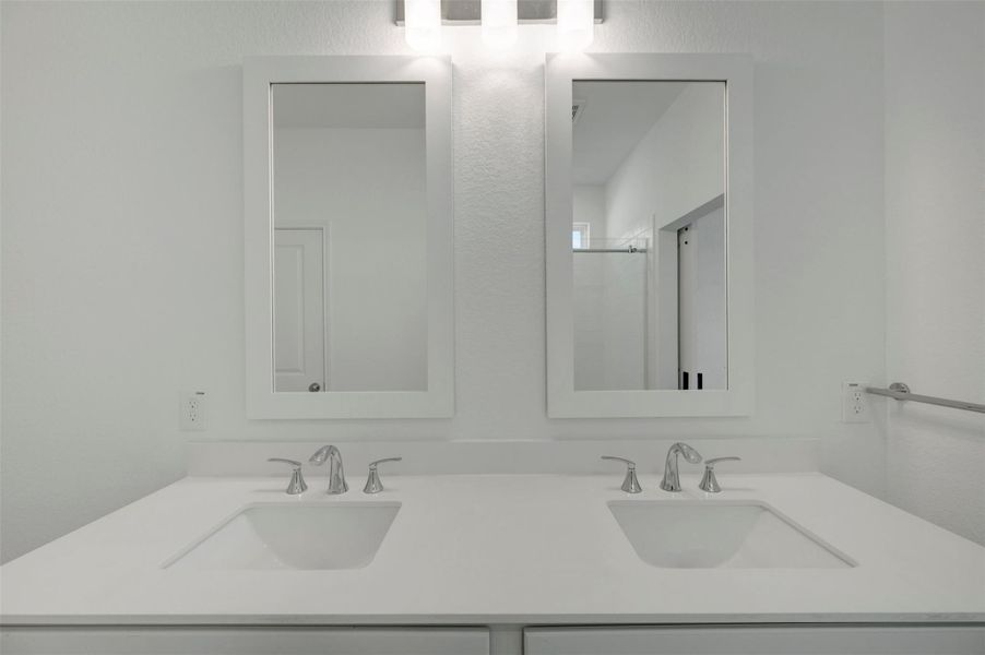 Relaxing primary bath with freestanding vanity Relaxing primary bath with freestanding vanity