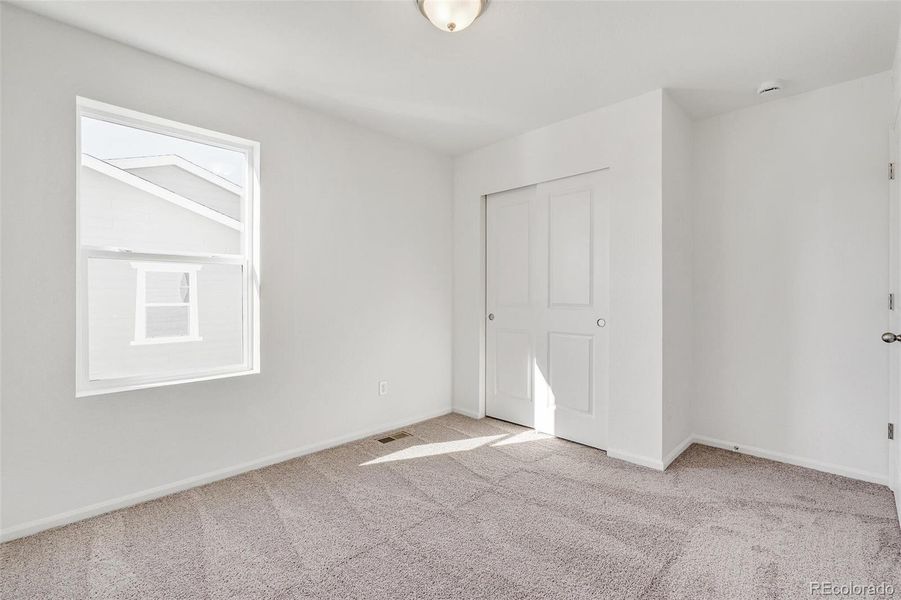 Spacious, unfurnished interior of a new home in Turnberry Villas, Commerce City (Image 33).