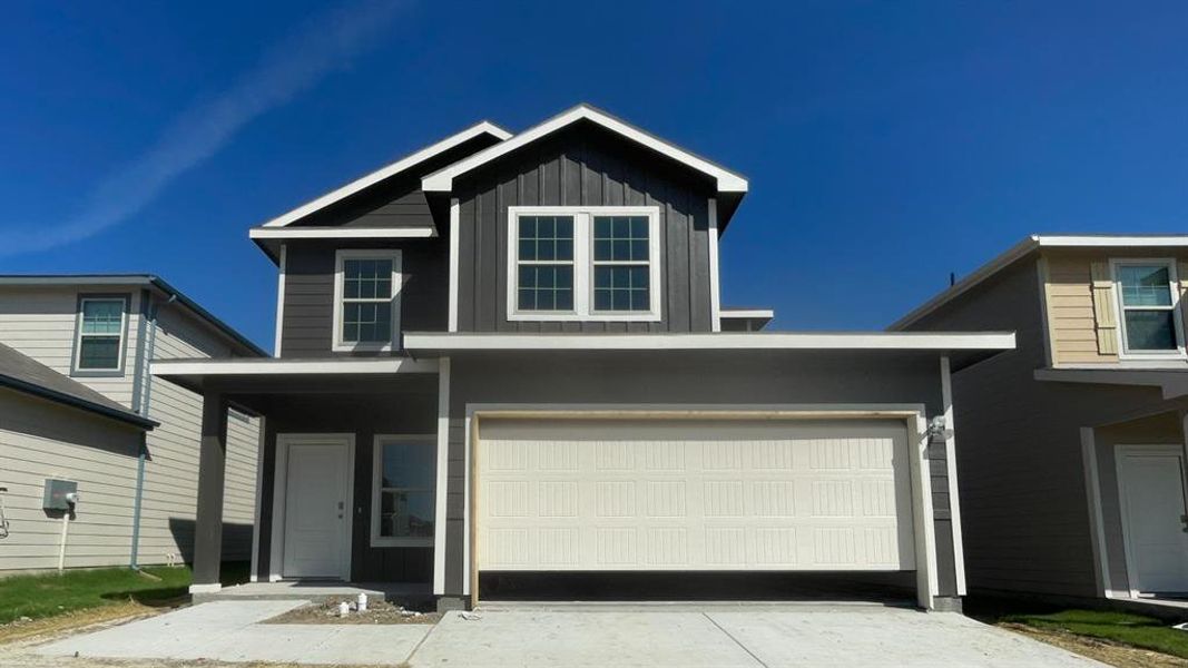 Front exterior of a new home in Wildwood, Royse City, TX, highlighting curb appeal (Image 2). Front exterior of a new home in Wildwood, Royse City, TX, highlighting curb appeal (Image 2).