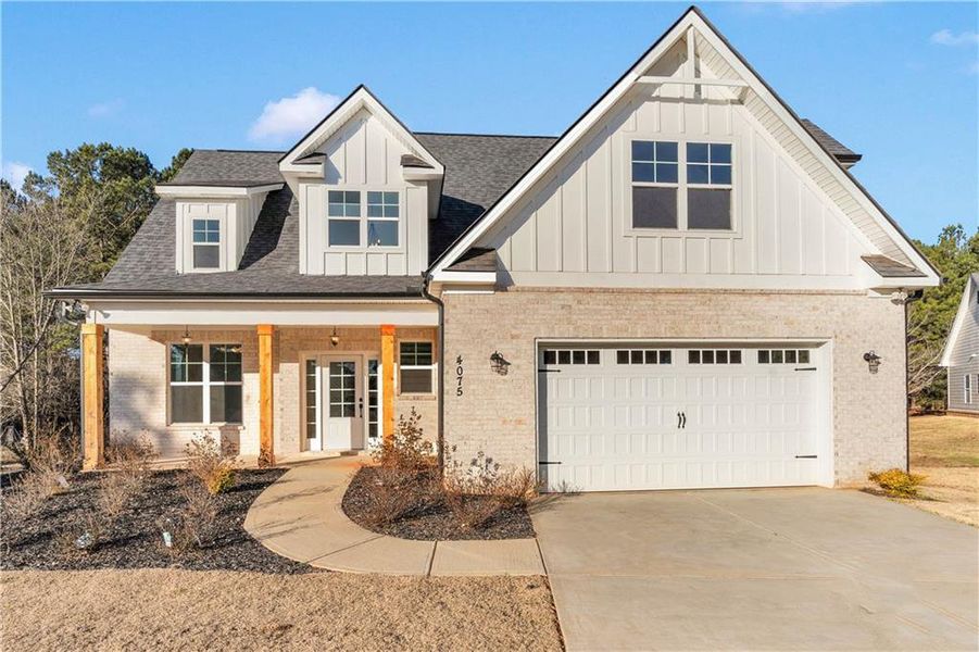 Front exterior of a new home in , McDonough, GA, highlighting curb appeal (Image 23).