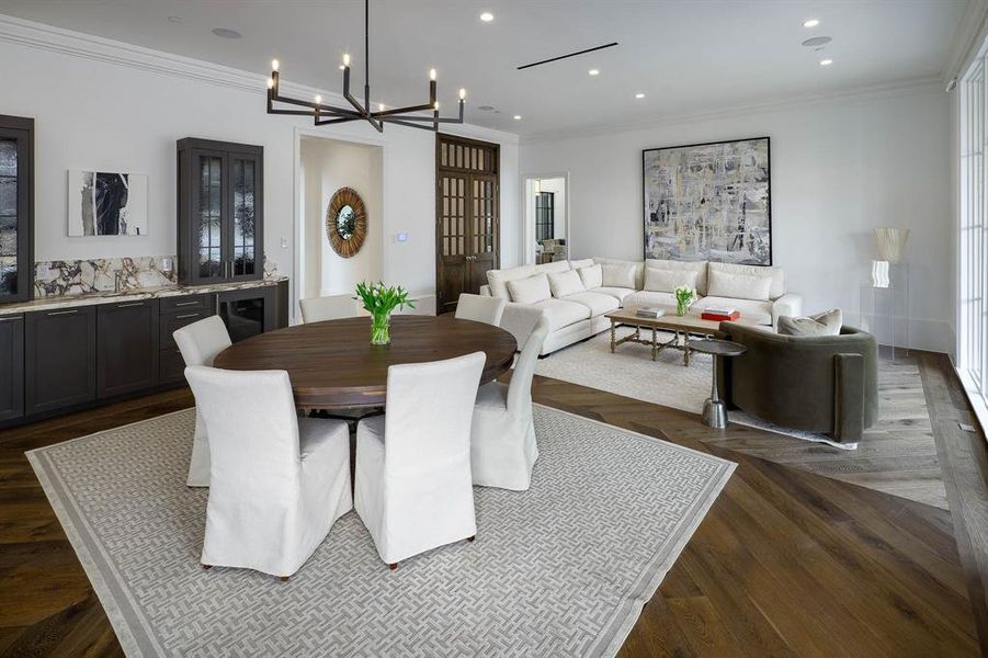 Lounge with wet bar & dinging area adjacent to temperature controlled room