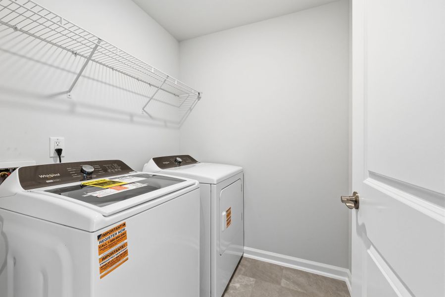 Close-up of interior finishes inside a home in Poets Walk, Whitsett (Image 13).