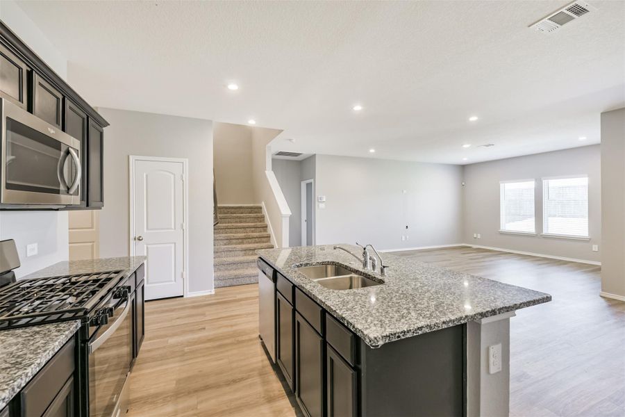 Furnished interior view inside a new home in Harrington Trails at The Canopies, New Caney (Image 8).
