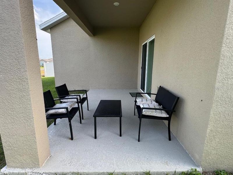 Exterior details and patio area of a home in Cypress Park Estates, Haines City (Image 20).