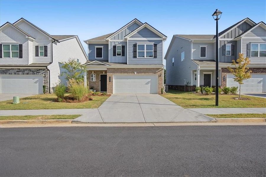 Front exterior of a new home in , Cartersville, GA, highlighting curb appeal (Image 29).