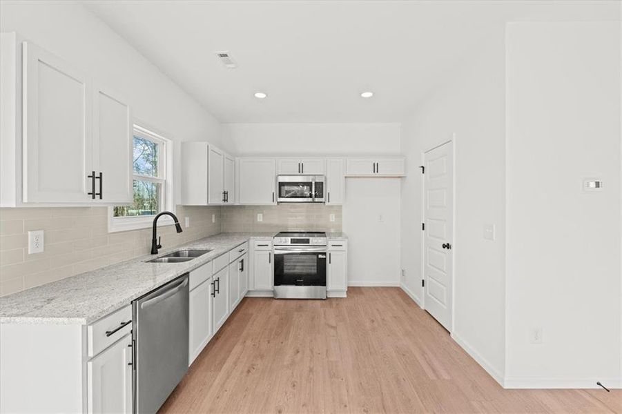 Furnished interior view inside a new home in , Carrollton (Image 7).