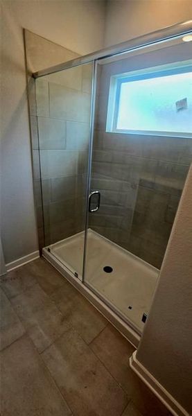 Furnished interior view inside a new home in Sunterra, Katy (Image 21).