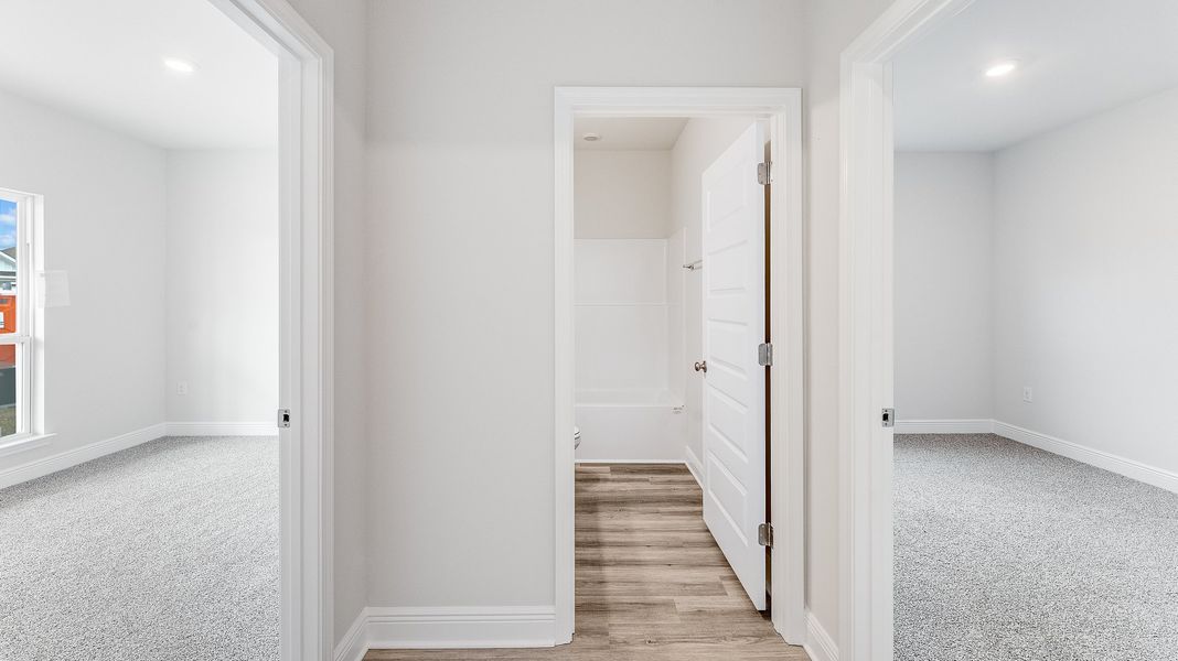 Representative unfurnished interior of a home built from the The Riverside by D.R. Horton in Hodges Bayou Plantation, Panama City (Image 17).