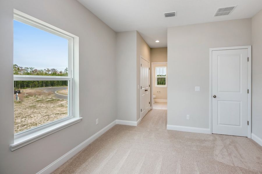 Representative unfurnished interior of a home built from the Walton by Riverside Homes in Mariposa at EverRange, Jacksonville (Image 47).