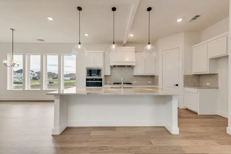 Furnished interior view inside a new home in Edgewater, Fate (Image 6).
