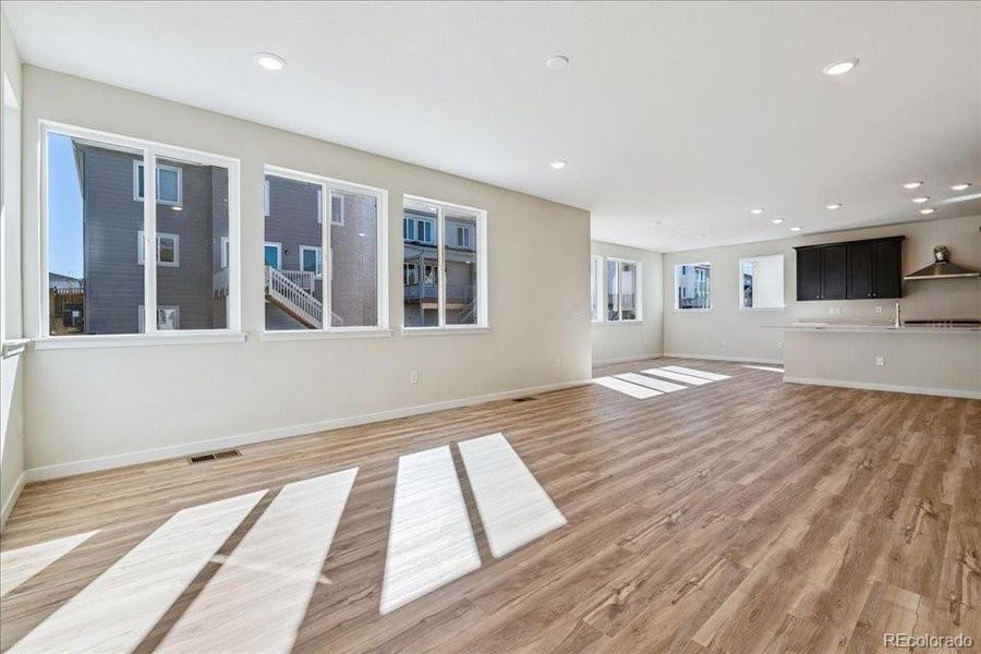 Spacious, unfurnished interior of a new home in Floret Collection at Alder Creek, Parker (Image 15).