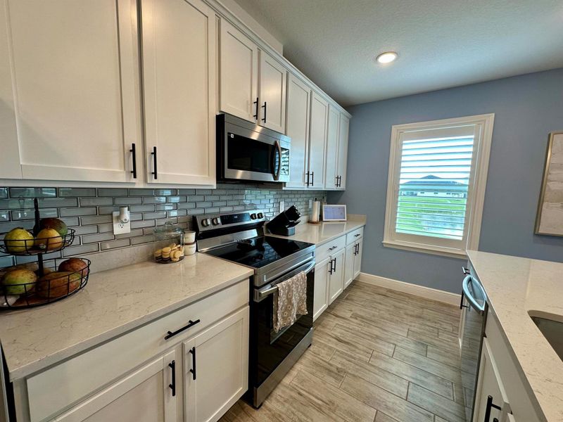 Furnished interior view inside a new home in , Port St. Lucie (Image 18).