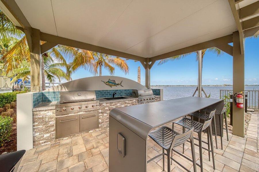 Exterior details and patio area of a home in , Stuart (Image 1).