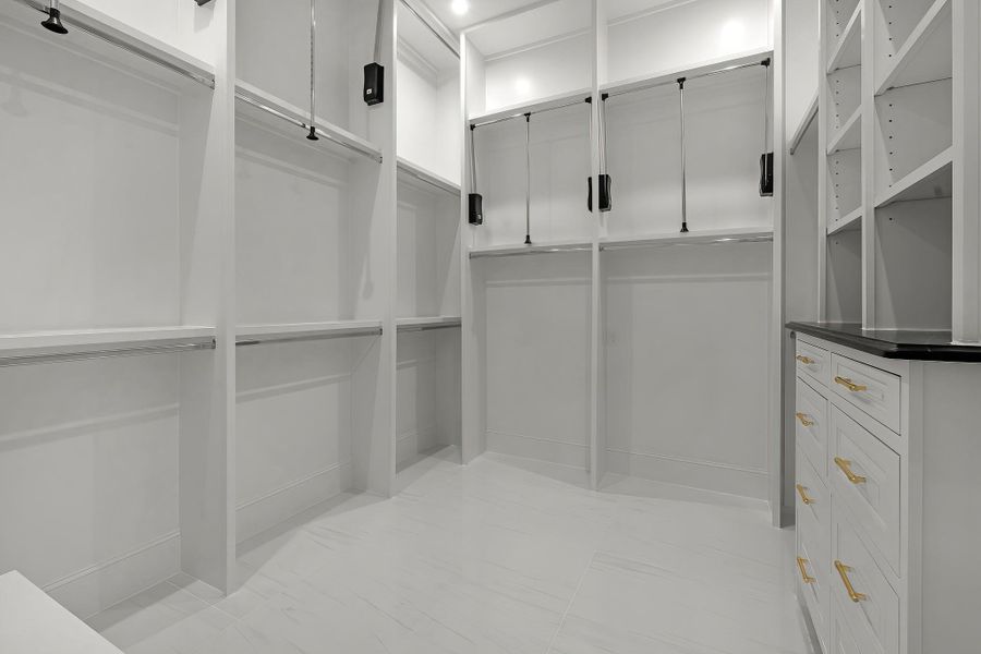 A view of your large primary walk-in Closet A view of your large primary walk-in Closet