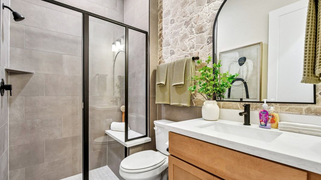 Representative furnished interior of a home built from the Elm by DRB Homes in Revelry, Del Valle (Image 13).