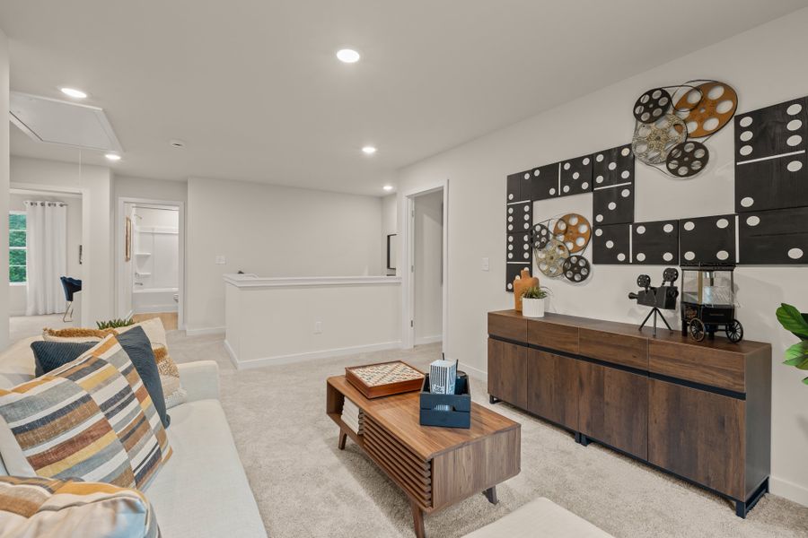 A living room with a couch and a coffee table.