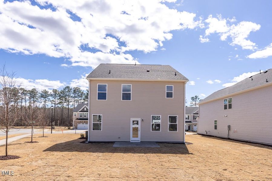 Front exterior of a new home in Gregory Village, Lillington, NC, highlighting curb appeal (Image 76). Front exterior of a new home in Gregory Village, Lillington, NC, highlighting curb appeal (Image 76).
