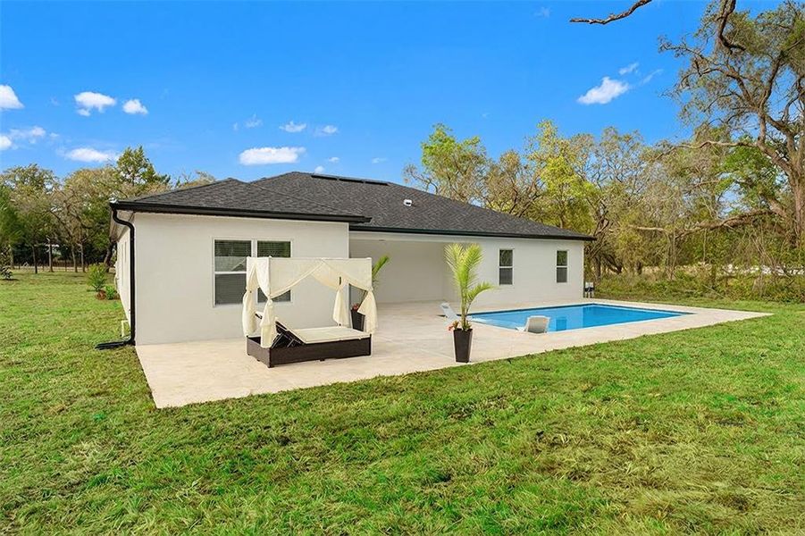 Exterior details and patio area of a home in , Spring Hill (Image 25). Exterior details and patio area of a home in , Spring Hill (Image 25).