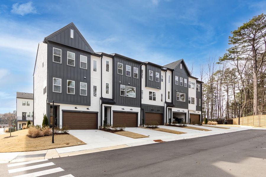 Front exterior of a new home in Archer Row, Charlotte, NC, highlighting curb appeal (Image 2). Front exterior of a new home in Archer Row, Charlotte, NC, highlighting curb appeal (Image 2).