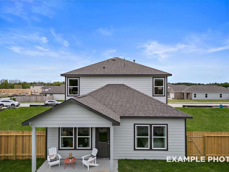 Exterior details and patio area of a home in Windmill Estates, Magnolia (Image 22).