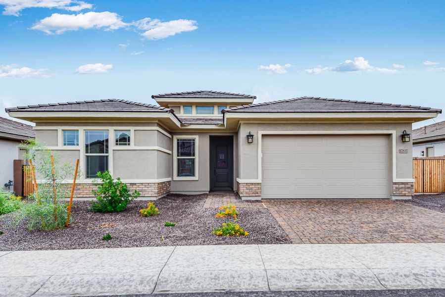 Representative exterior photo of a completed home built from the Hillary by Taylor Morrison in Allen Ranches Expedition Collection, Litchfield Park, AZ (Image 21). Representative exterior photo of a completed home built from the Hillary by Taylor Morrison in Allen Ranches Expedition Collection, Litchfield Park, AZ (Image 21).