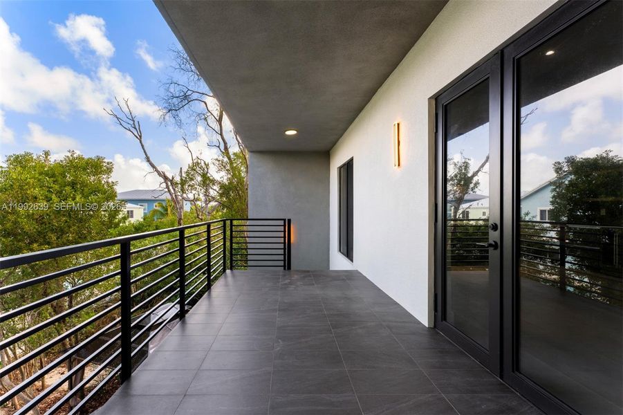 Exterior details and patio area of a home in , Key Largo (Image 36).