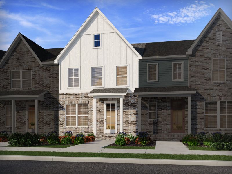 Front exterior of a new home in Greystone - Vista Townhomes, Smyrna, TN, highlighting curb appeal (Image 1). Front exterior of a new home in Greystone - Vista Townhomes, Smyrna, TN, highlighting curb appeal (Image 1).