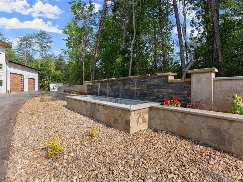 Exterior details and patio area of a home in , Dahlonega (Image 50).
