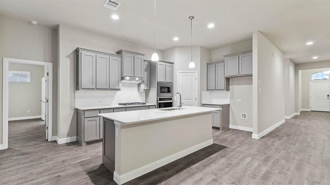 Kitchen - All Home and community information, including pricing, included features, terms, availability and amenities, are subject to change at any time without notice or obligation. All Drawings, pictures, photographs, video, square footages, floor plans, elevations, features, colors and sizes are approximate for illustration purposes only and will vary from the homes as built. Kitchen - All Home and community information, including pricing, included features, terms, availability and amenities, are subject to change at any time without notice or obligation. All Drawings, pictures, photographs, video, square footages, floor plans, elevations, features, colors and sizes are approximate for illustration purposes only and will vary from the homes as built.