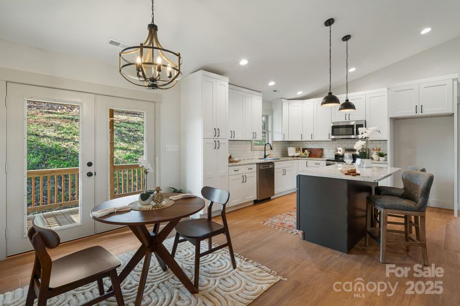 Dining area looking to kitchen Dining area looking to kitchen