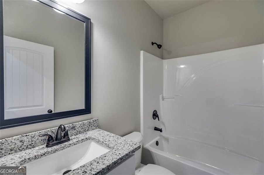 Furnished interior view inside a new home in , Buchanan (Image 10).