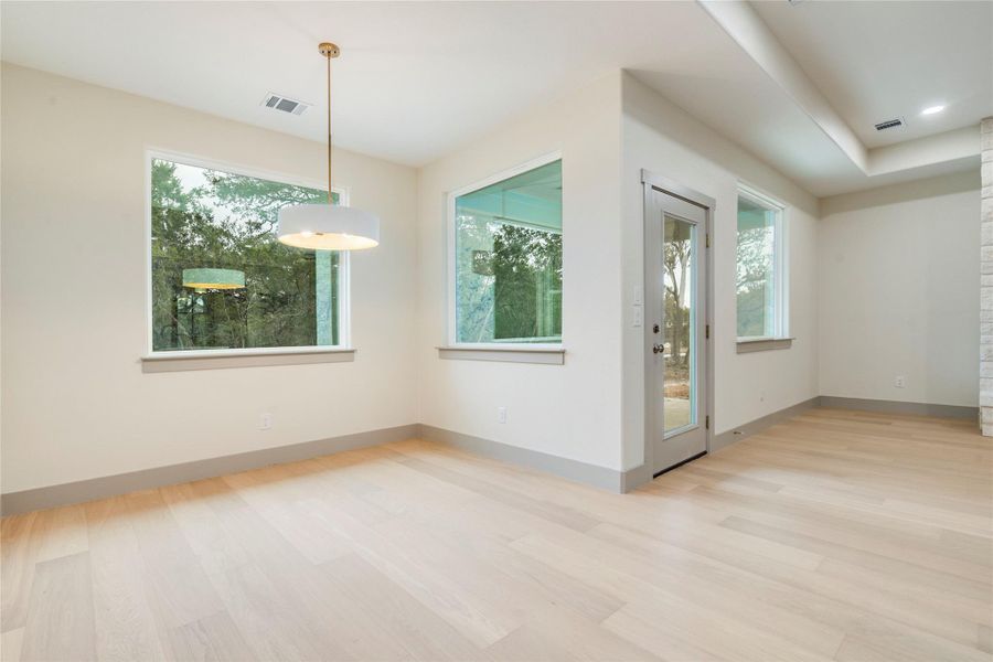 Empty room featuring light wood-style floors