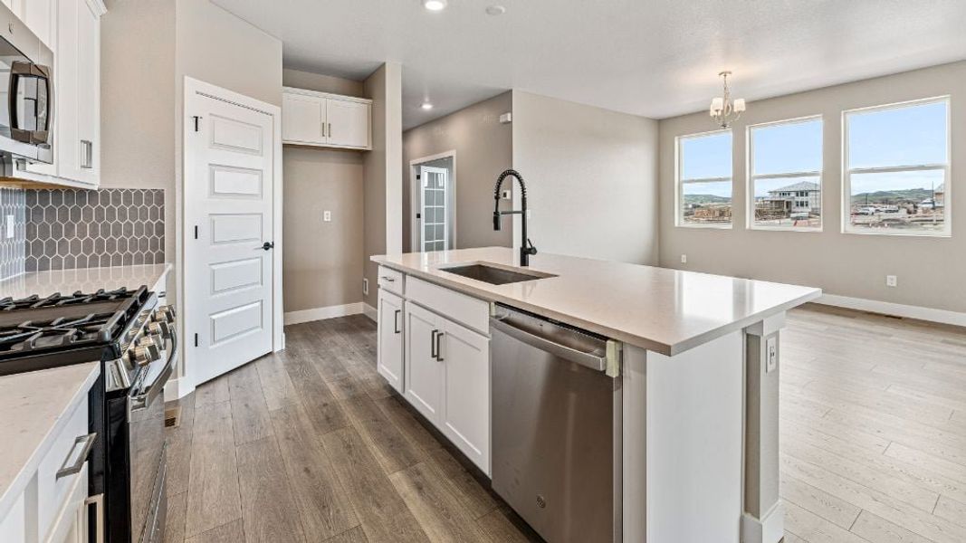 Representative furnished interior of a home built from the Pike by Taylor Morrison in The Aurora Highlands Town Collection, Aurora (Image 19).