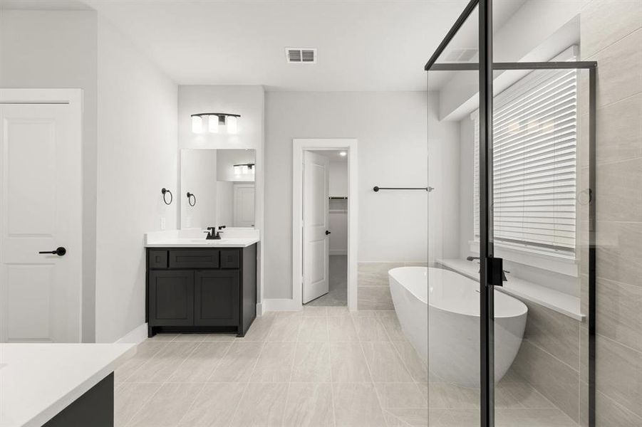 Furnished interior view inside a new home in Woodcreek, Fate (Image 6).