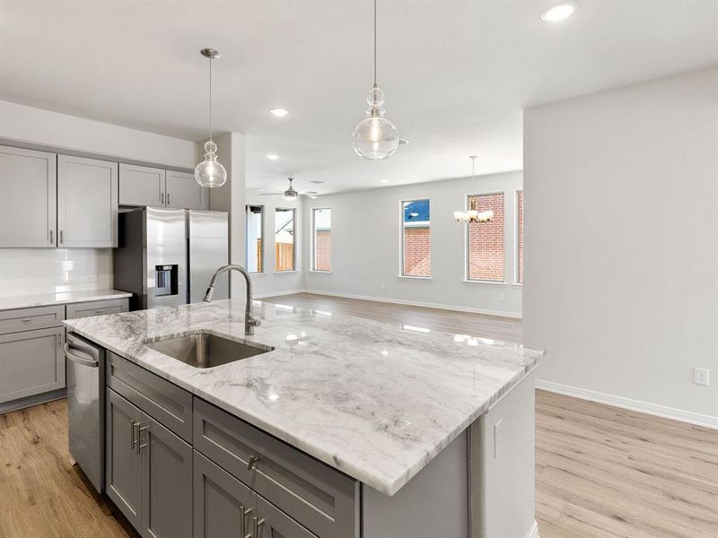 With the island open to the dining and family rooms, the chef in the family will never be left out of the party.