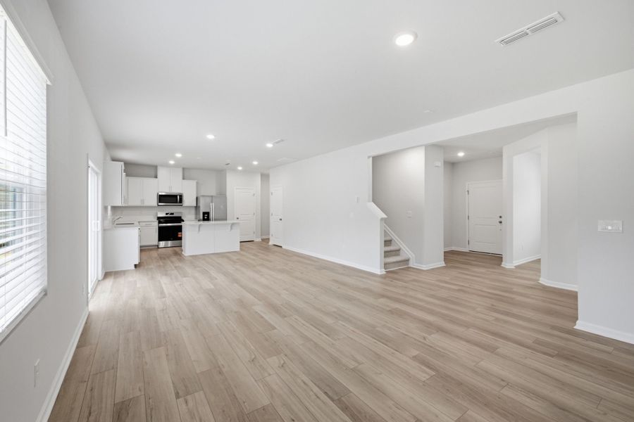 Spacious, unfurnished interior of a new home in Carpenter Falls, Durham (Image 23).