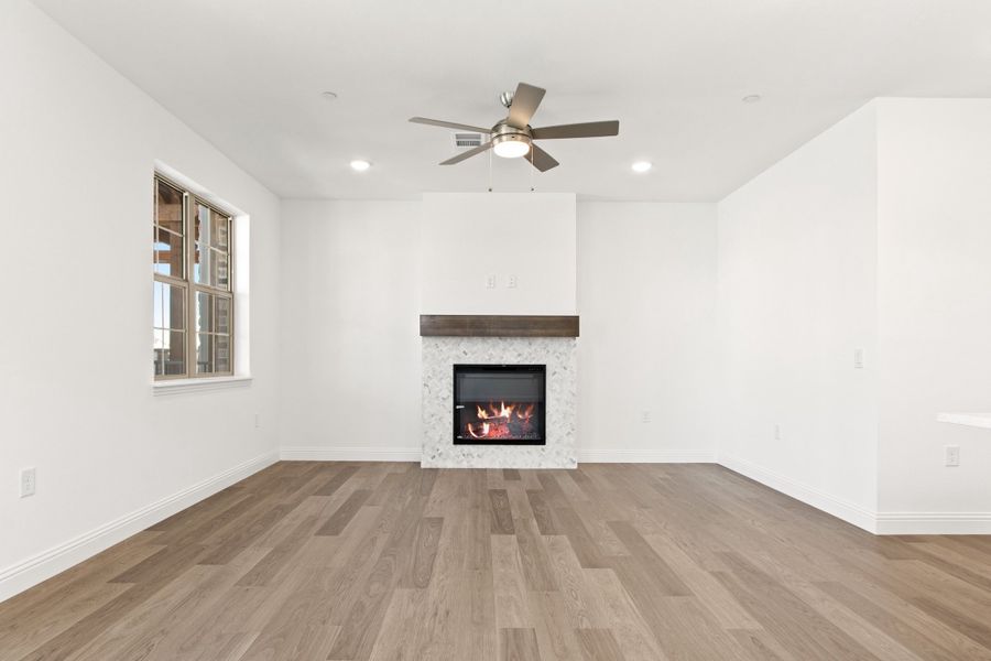 Spacious, unfurnished interior of a new home in The Tribute, The Colony (Image 21).
