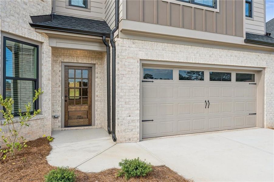 Front exterior of a new home in , Lawrenceville, GA, highlighting curb appeal (Image 28).