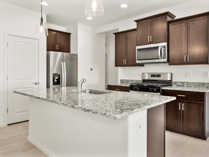 Furnished interior view inside a new home in Las Patrias at Star Valley Phase III - Signature Series, Tucson (Image 2). Furnished interior view inside a new home in Las Patrias at Star Valley Phase III - Signature Series, Tucson (Image 2).