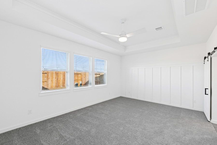 Tranquil primary suite with feature wall (*Photo not of actual home and used for illustration purposes only.) Tranquil primary suite with feature wall (*Photo not of actual home and used for illustration purposes only.)