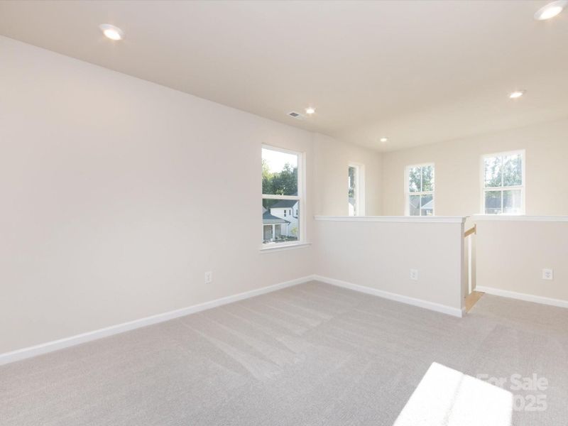 Loft adding more livability to the home. Perfect for a lounge or home office.