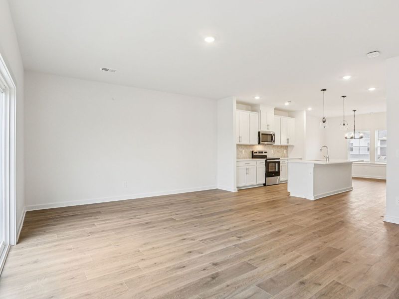 Spacious, unfurnished interior of a new home in Greystone - Highland Townhomes, Smyrna (Image 10).