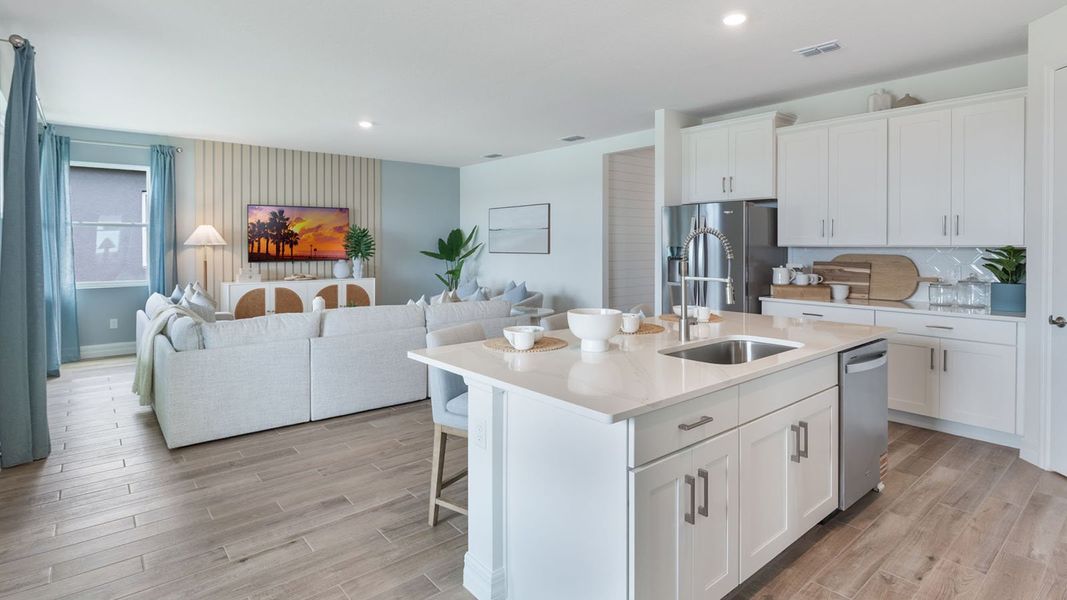 Representative furnished interior of a home built from the DENHAM by D.R. Horton in Lakes of Mount Dora, Mount Dora (Image 18).