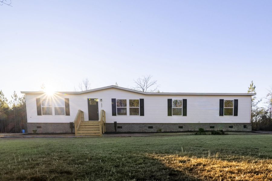 Exterior details and patio area of a home in , St. Stephen (Image 3).