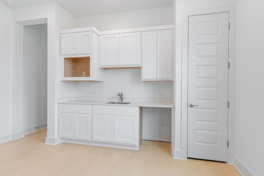 Furnished interior view inside a new home in Hilltop Ranch, Leander (Image 13).