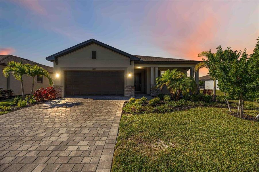 Front exterior of a new home in , Port Charlotte, FL, highlighting curb appeal (Image 2).