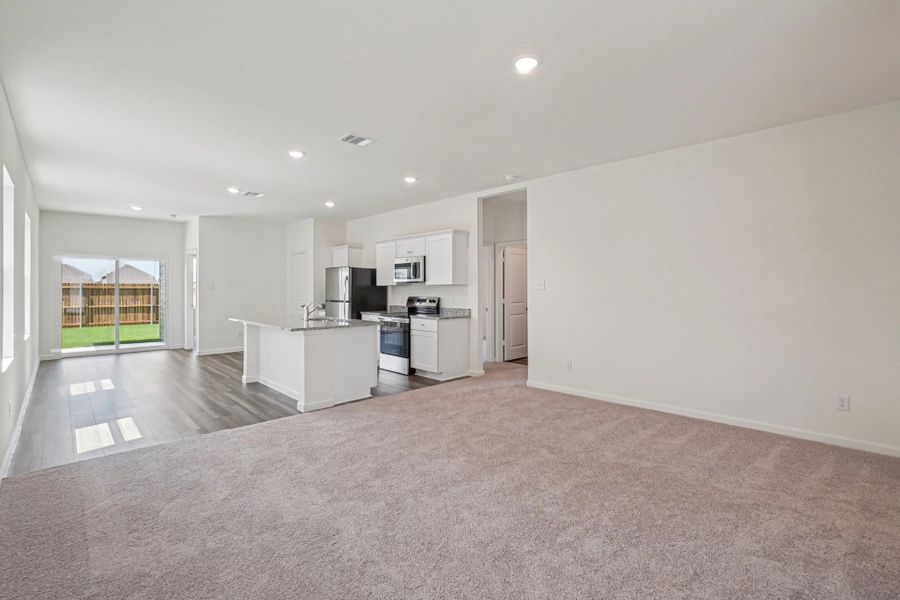 Representative unfurnished interior of a home built from the Odyssey by Starlight Homes in Williams Landing, Waller (Image 13).